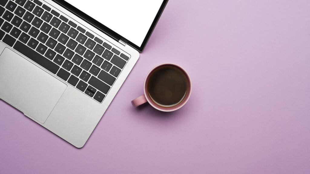 mockup laptop computer and coffee cup on purple ba 2026 03 13 05 33 56 utc scaled